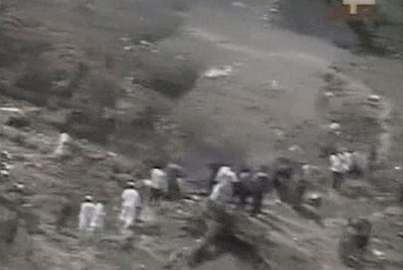 Extrait d'une vid�o qui montre les d�bris du Boeing 737 qui s'est �cras� au Nig�ria samedi 22 octobre au soir. | REUTERS/REUTERS TV